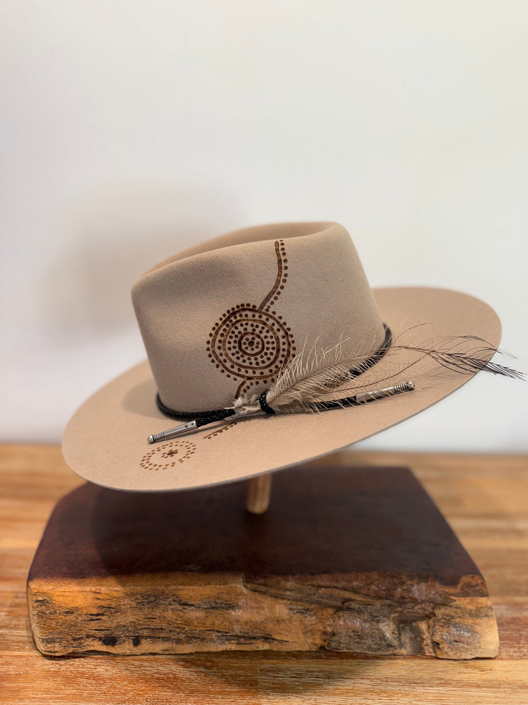 Meeting Place Paired With Emu Feathers