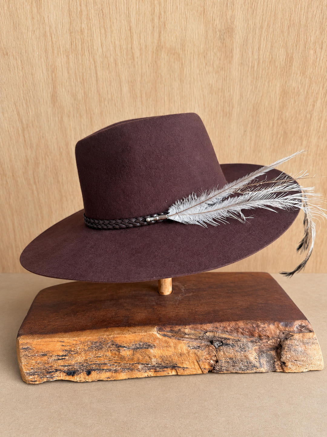 Burgundy soft wool paired with emu feathers